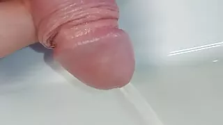 small wet penis of a young gaypeeing