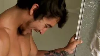 Naughty jock Jizzy Mcbone masturbates big cock in shower