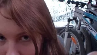 A beautiful brunette teen from Germany gets her pussy banged in the car