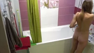 My blonde exgf doing her makeup nude in the bathroom