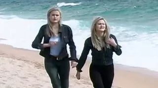 An amazing looking blonde MILF pleasing a cock on the beach