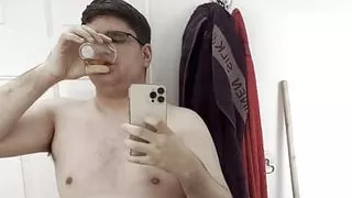 21yo boy peeing in a transparent cup, and drinks his own pee (in front of the mirror)