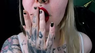 Putting a red lipstick and then ruin it on my face