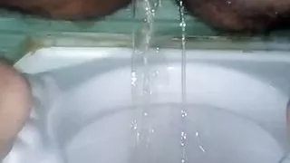 Desi kuri Pissing in bathroom handjob Pakistani mea g handjob big cock squirt kuri in bathroom