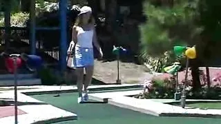 Little April outdoors enjoying solo play