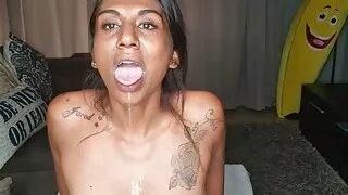 Desi sits on the couch drooling as she sticks out and wiggles her tongue around