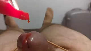 Heißwachs auf Schwanz und Eier