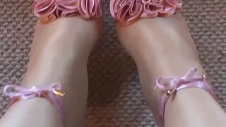My sexy legs wearing super shiny layered pantyhose and sexy pink high heels.