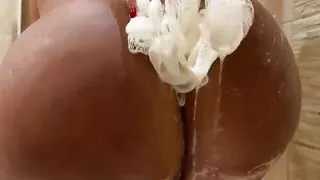 trans Erika Schinaider taking a shower