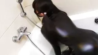Fejira com In the water stroking the whole body in tight leather