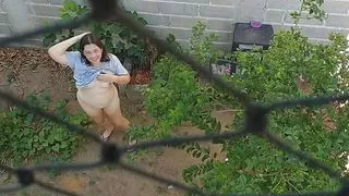 Bottomless wife goes outside and walk near workers