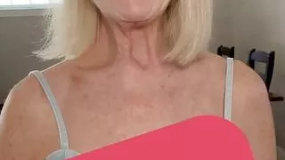 Older stepmom Danielle Dubonnet shows her tits to a fan on camera