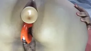This big ass swallows a vibrating dildo, a vibrating egg and a cock at the same time