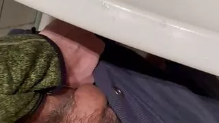 Pissing in the toilet. Open up your mouth