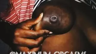 Playing with my boobs. Come suck them