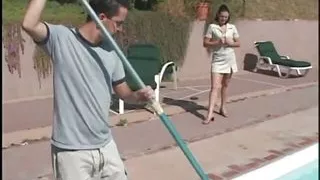 Milf is on her knees sucking a cock and playing with his balls