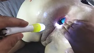 This big ass pig is happy when her owner puts big balls in her ass hole