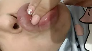 I love to lick my fingers with my big lips