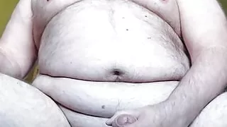 Jerking off in front of the window for an audience