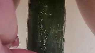 Cucumber pussy piss