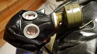 rubber gasmask nun is ramming asshole with two big dicks