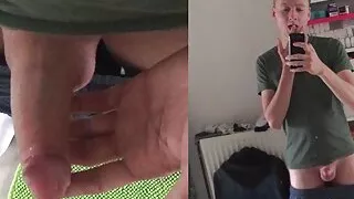 Cute twink tasting his cum in front of the mirror