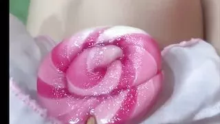 Caresses himself with candy