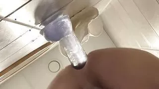 Sissy fucks her pussy by big transparent dildo
