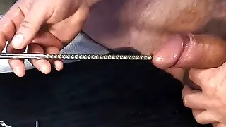 Multiple objects in cock. Extreme urethral sounding + cum. Hard oiled cock stuffed full.
