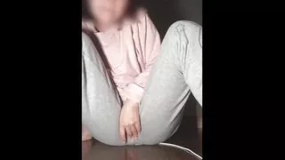 Cute woman masturbating while imagining a man's penis