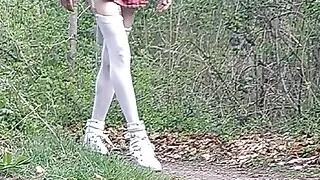 Exhibition in the forest with schoolgirl mini-skirt