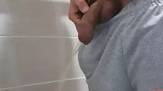 Guy pissing with uncircumcised cock and big balls