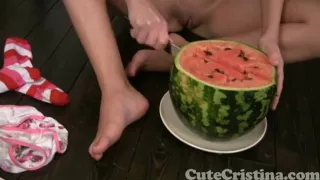 Cute Cristina plays naked with watermelon