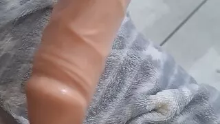 Dildo play at home waiting for the real large dick to ride him as soon