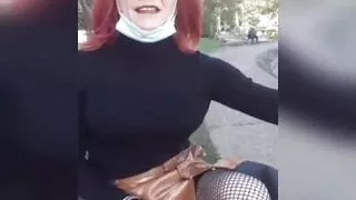 sissy slut in bourgeois outfit at the public garden
