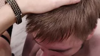 Mistress teaches to suck the male members of her slave correctly on her strapon