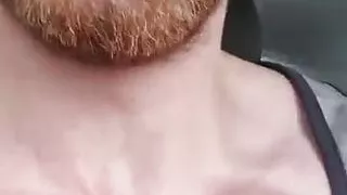 Muscular fitness guy bodybuilder is masturbate driving a car