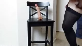 Sissy Maid Candy in her latex dress rides her huge dildo hard