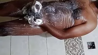 Black guy fucks his girlfriend's roommate in the bathroom.