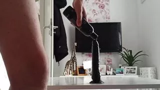 Anal dildo fuck on the table with cum
