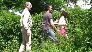 Good looking teen girl gets fucked by two rods near the road