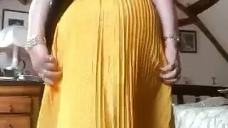 In yellow dress with polka dots