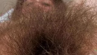 Hairy pussy babe Brooke strips down to show off her amazing fur