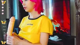 A Young Asian Woman Tries Sucking A Dildo In Front Of The Audience