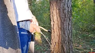 On a walk in the forest, pissing under a tree