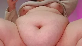 Beautiful chubby girl with a soft belly