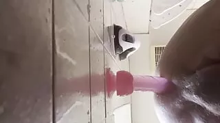 Fat guy taking dildo deep in shower