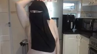 Dancing fully nude in Niqab