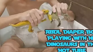 ABDL Diaper Boy Playing With Dinosaurs toys in the Hot Tube