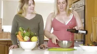 Chubby lesbians play with carrot